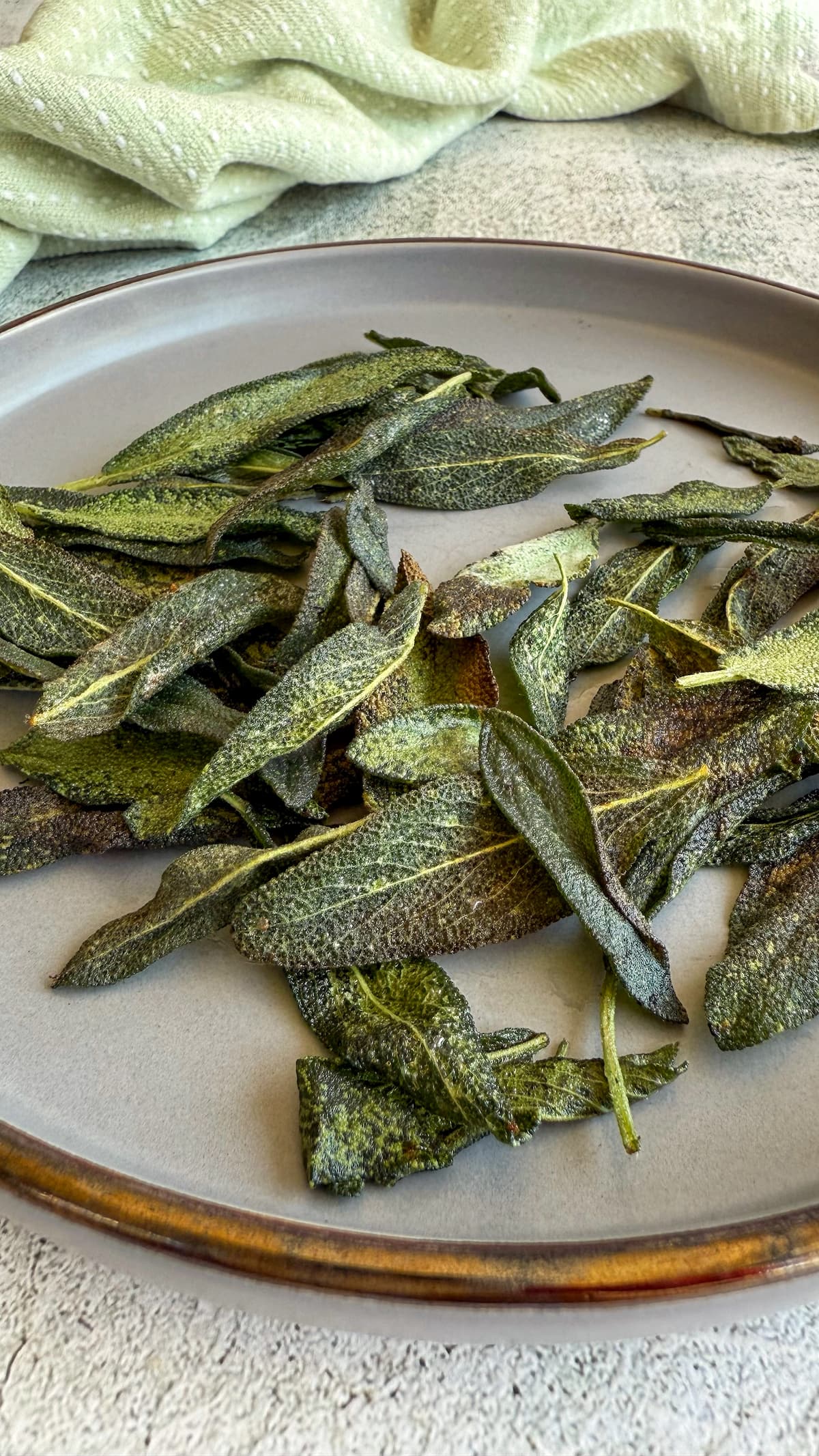 crispy sage leaves on a plate