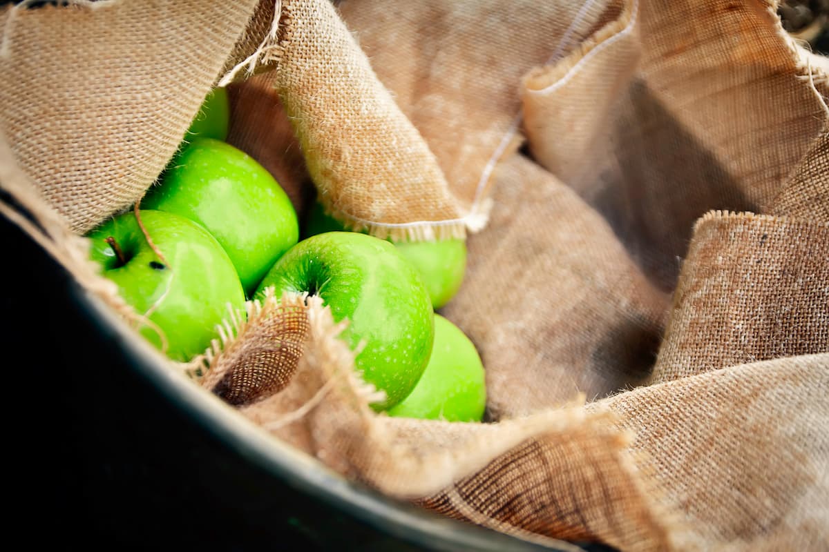 green apples in a basket