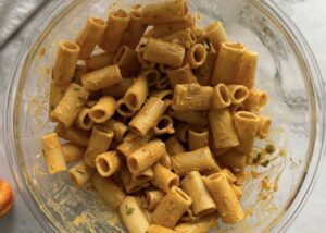 rigatoni in a creamy orange sauce in a bowl