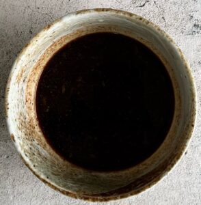 bowl of black liquid.