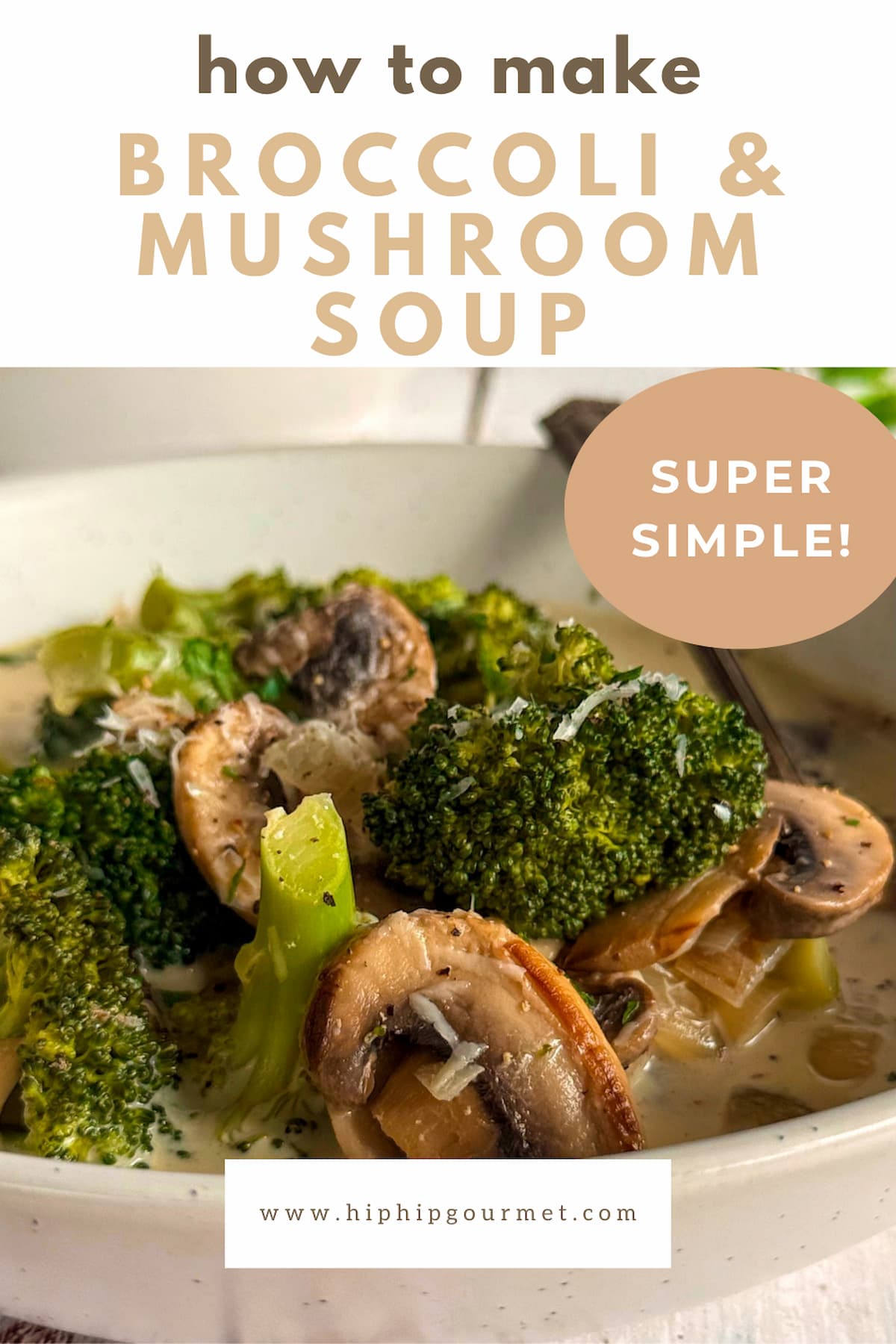 side view of a white bowl of broccoli and mushroom soup with freshly grated parmesan cheese on top, spoon in the bowl.