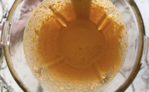 orange sauce in a blender.