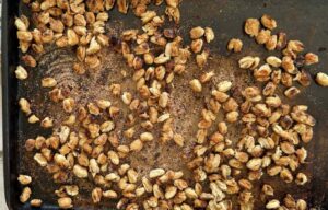 crispy seasoned white beans on a tray.