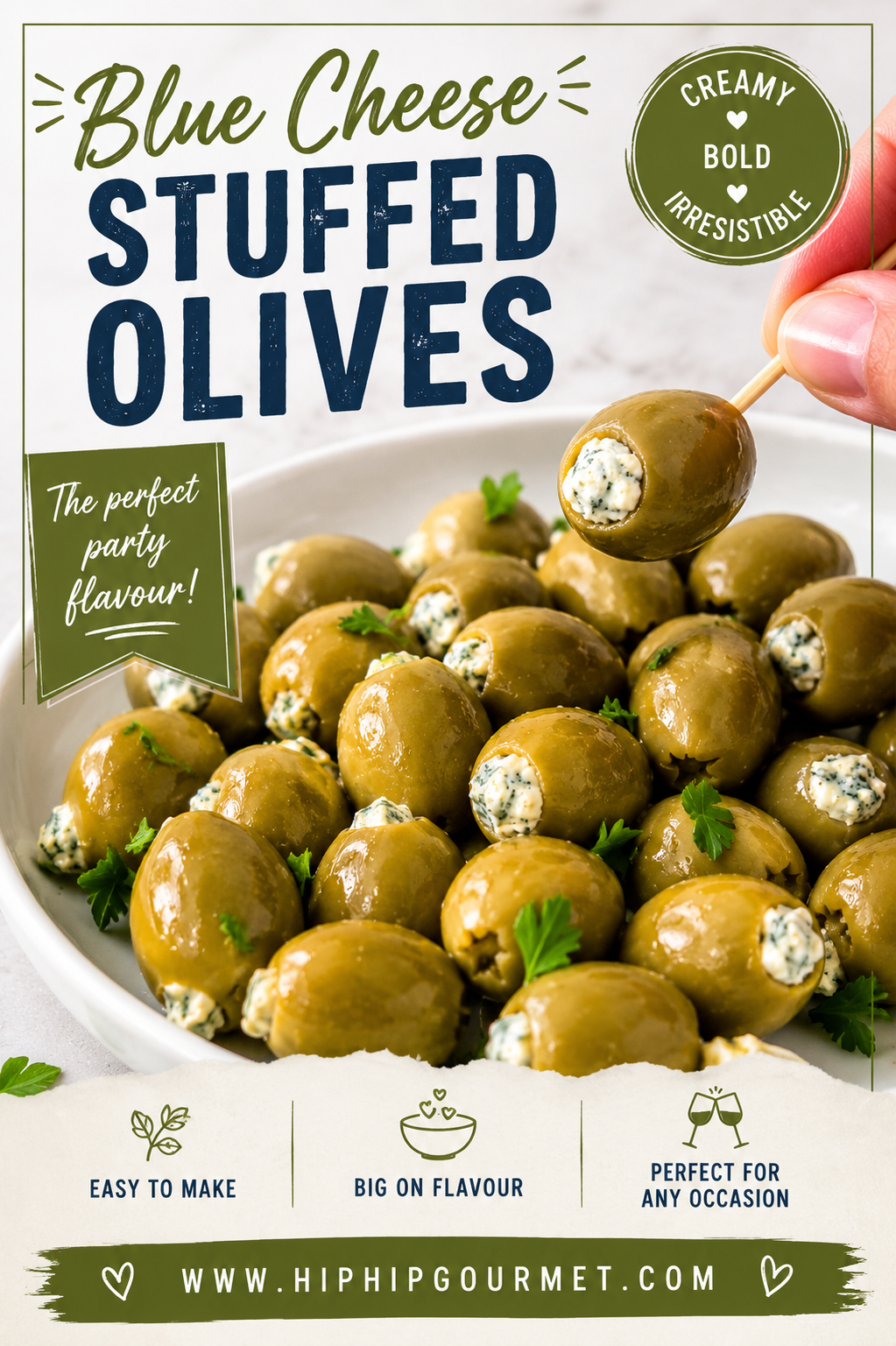Hand picking up a blue cheese stuffed green olive with a toothpick above a plate with more garnished with fresh parsley.