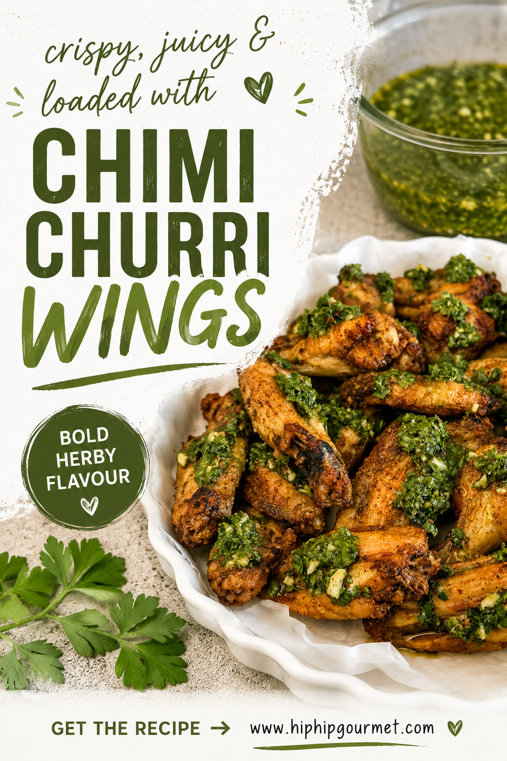 chimichurri chicken wings piled in a white serving place with extra chimichurri in a bowl in the background.