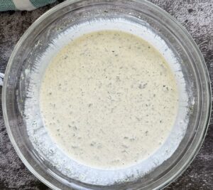 glass bowl of homemade creamy ranch dressing.