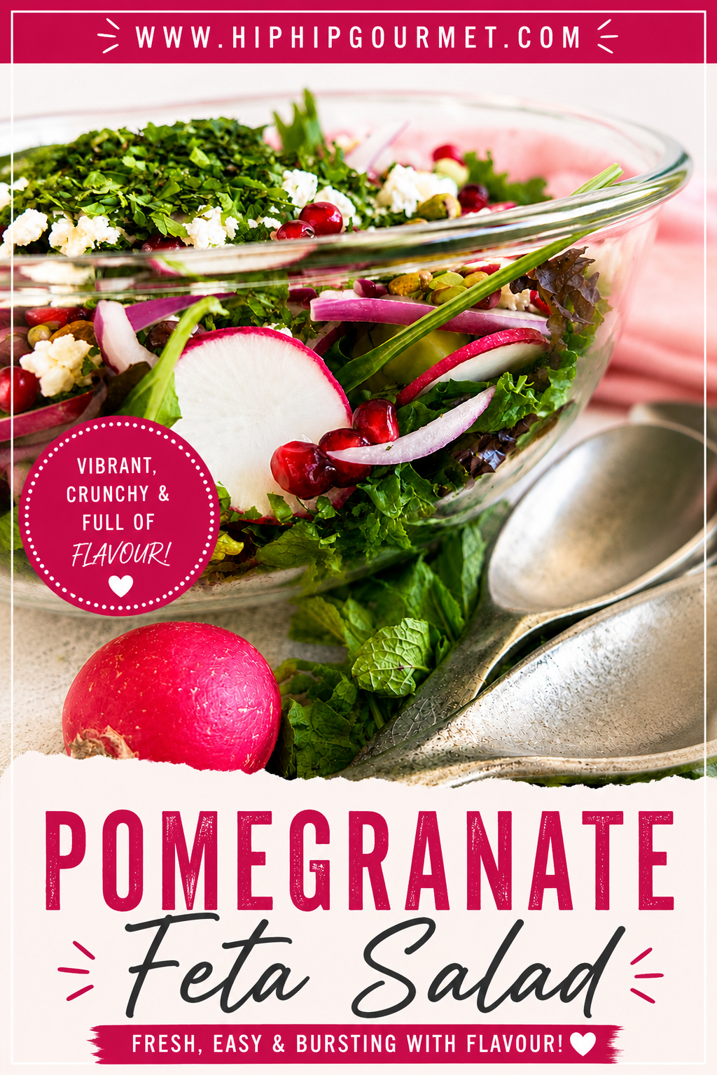 pin for pomegranate and feta salad for pinterest. Close up side view of a fresh pomegranate feta salad with mixed greens, radishes, cucumber, red onion, pistachios, fresh herbs, and crumbled feta in a clear glass serving bowl.