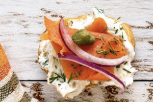 Smoked salmon crostini with herbed cream cheese, red onion, capers, and fresh dill.