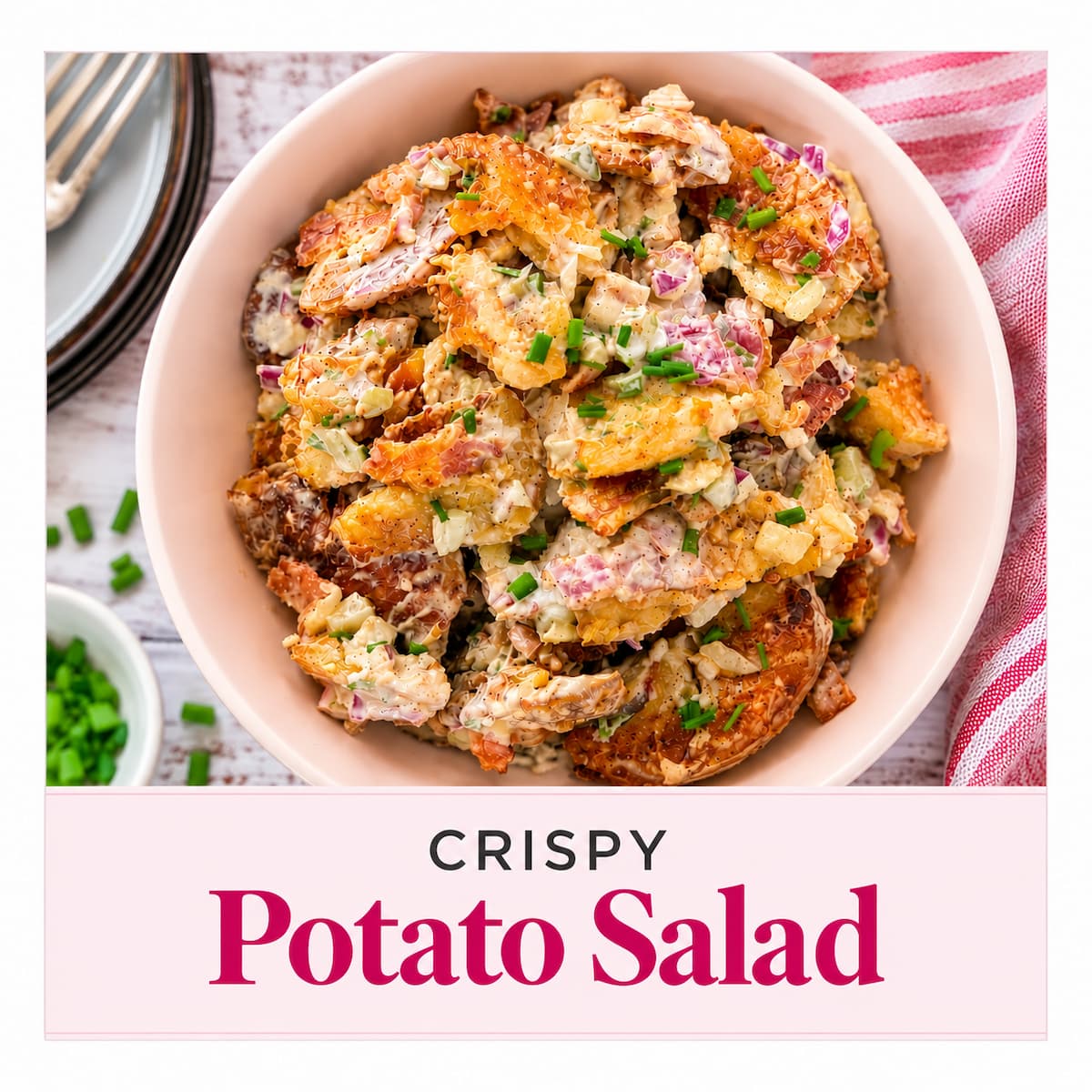 Crispy potato salad with golden smashed potatoes, bacon, red onion, pickles and fresh chives in a creamy dressing.