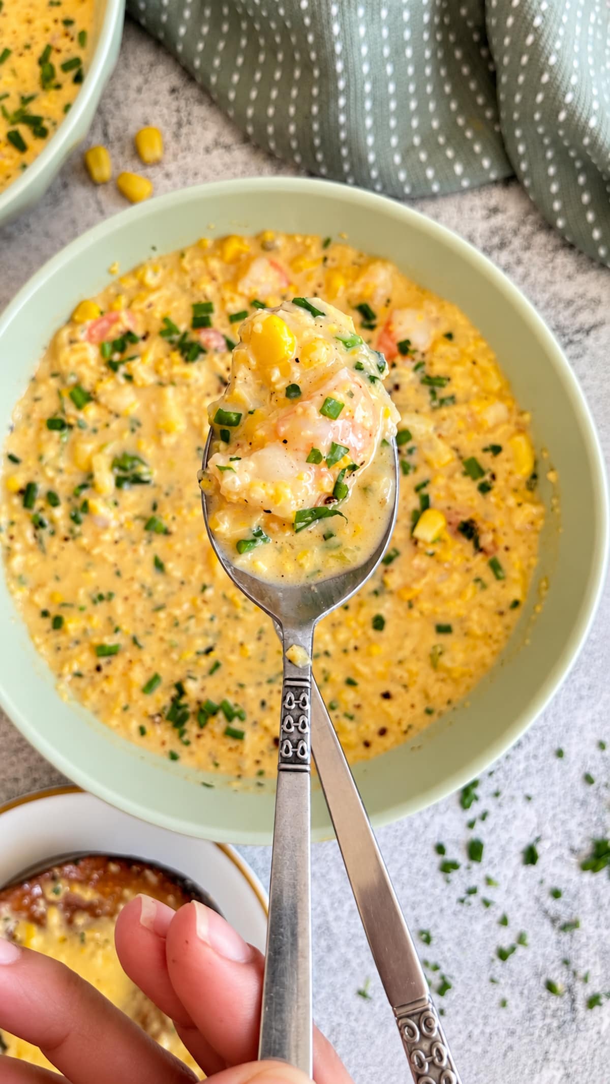 Creamy shrimp and corn chowder with tender shrimp, sweet corn, and fresh herbs served by the spoonful.